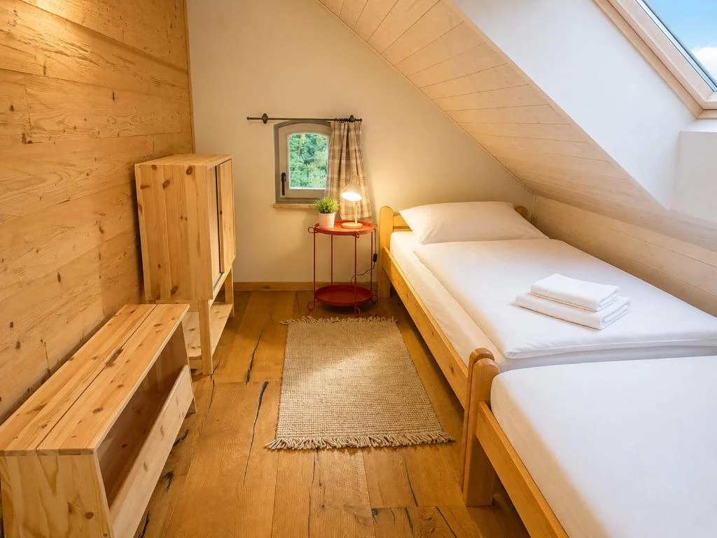Schlafzimmer im Obergeschoss 2 · Ferienhaus Alte Provinz