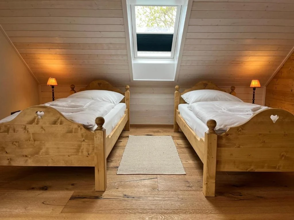 Schlafzimmer im Obergeschoss 3 · Ferienhaus Alte Provinz