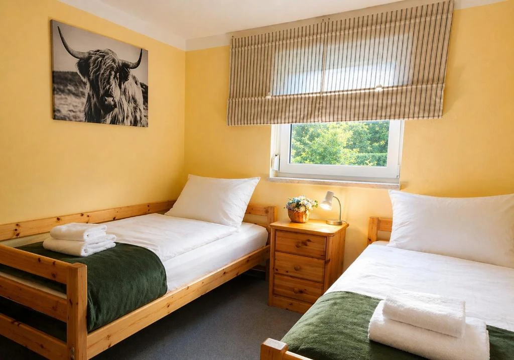 Schlafzimmer 1 · Ferienhaus Bucheneck
