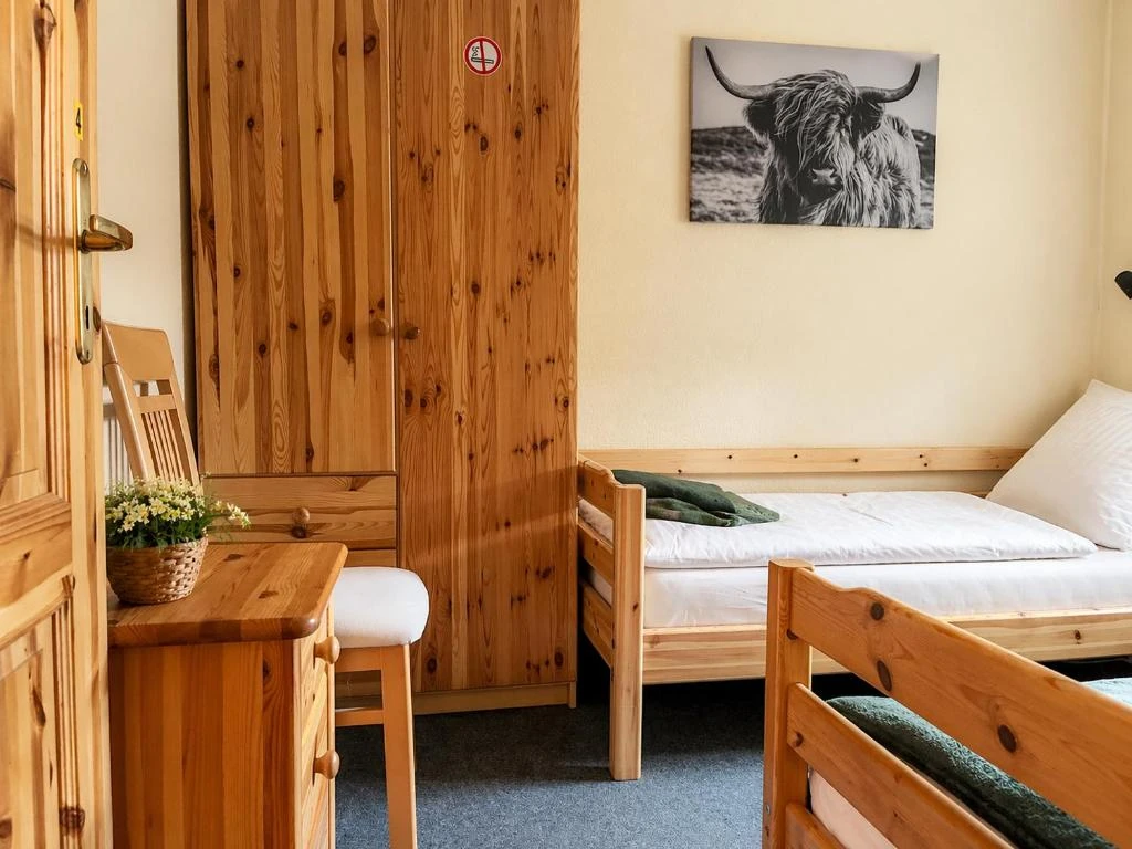 Schlafzimmer 2 · Ferienhaus Bucheneck