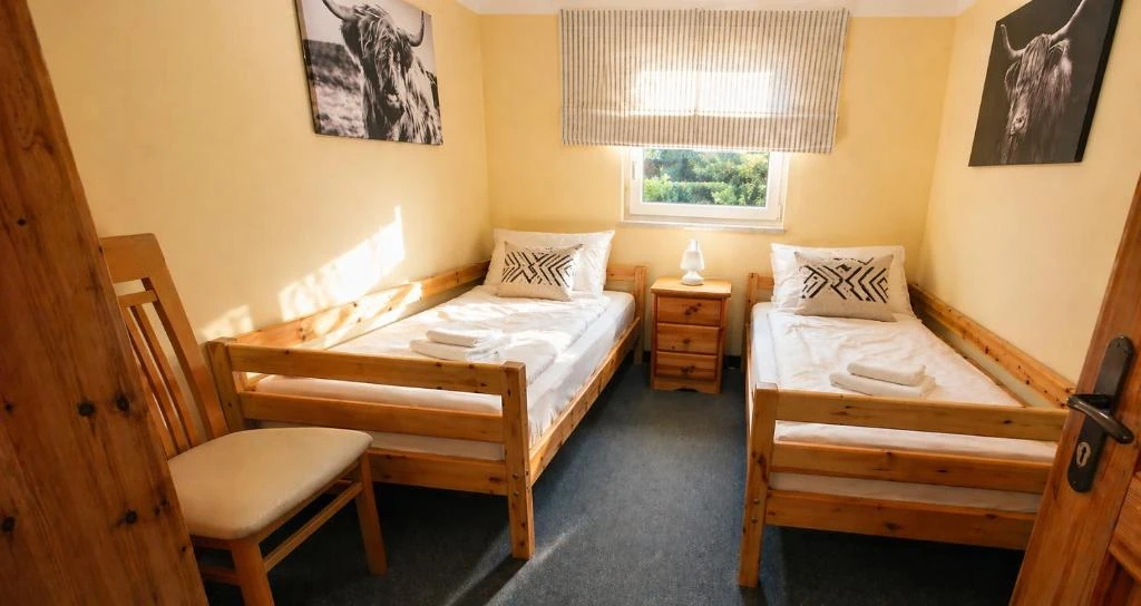 Schlafzimmer 3 · Ferienhaus Bucheneck