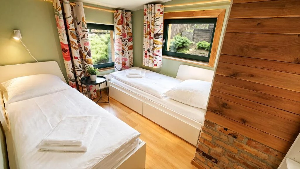 Schlafzimmer im Obergeschoss · Der grüne Fürst · Ferienwohnung Hinterhaus